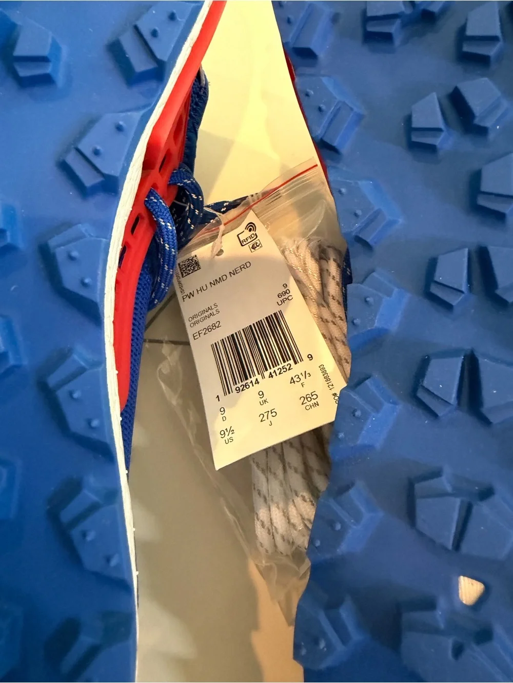 adidas Blue and Red Pharrell Williams NMD Sneakers
